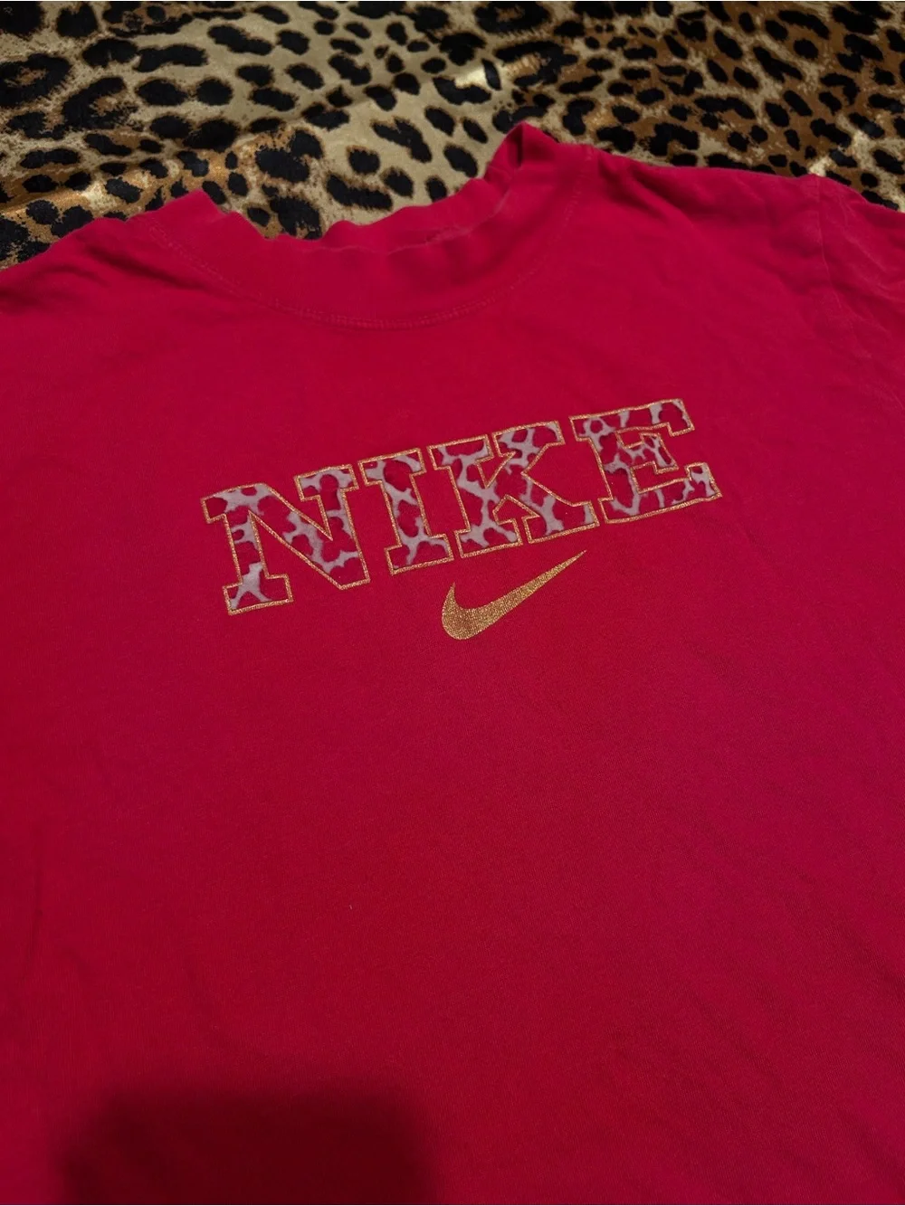 Nike Youth Loose Fir Hot Pink T Shirt with Cow Print Logo